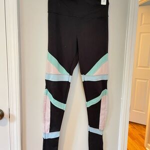 Black and Pink Geometric Leggings with Cutout Patterns